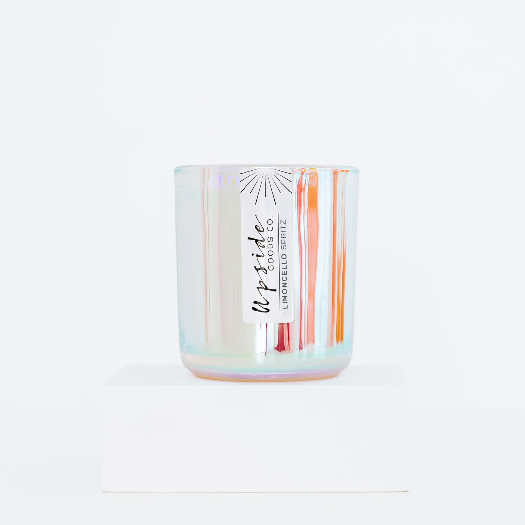 Limocello Scented Soy Candle in a reusuable irredescent container