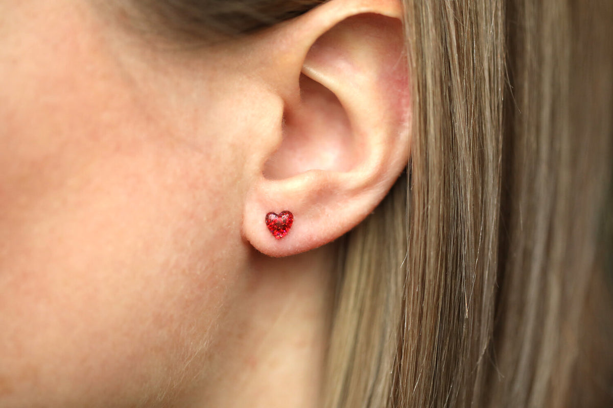Mini Red Heart Earrings on Model