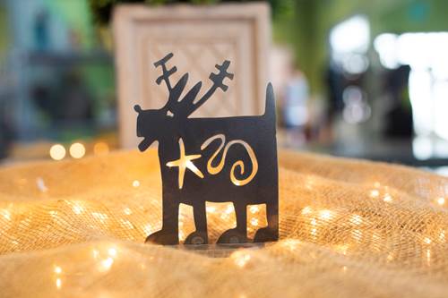 Metal Dog Sculpture with reindeer antlers