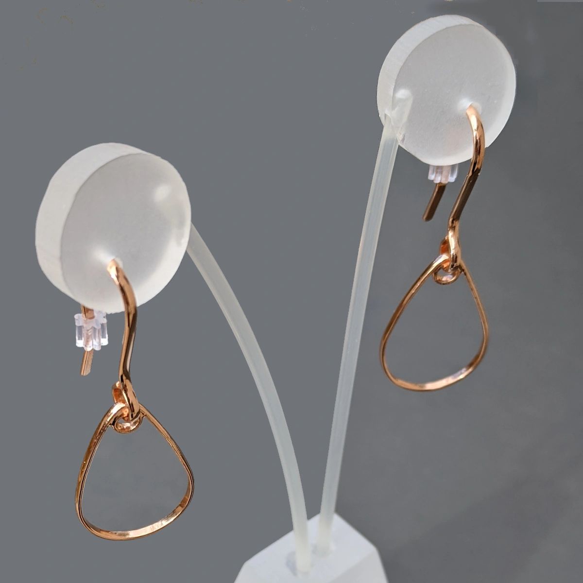 Rose Gold Teardrop Earrings on Earring Stand