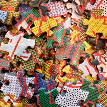 Collection of colorful puzzle pieces with various patterns