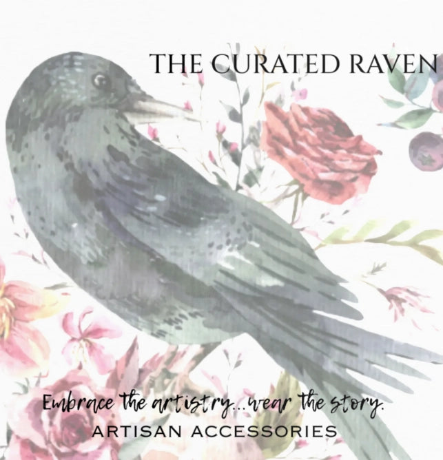 Decorative image with a bird and flowers, featuring 'The Curated Raven' brand.