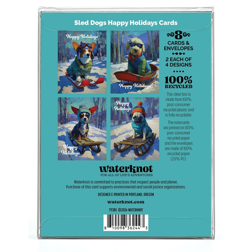 Back of a Waterknot 'Sled Dogs Happy Holidays Cards' box, showing four holiday-themed dog illustrations, product details including '8 cards & envelopes' and '100% recycled,' plus a barcode and address on a teal background.