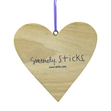 Wooden heart-shaped sign with 'Sincerely, Sticks' branding on a white background
