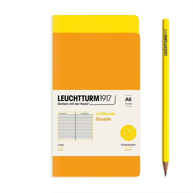 Orange notebook with yellow cover and matching pencil on a white background