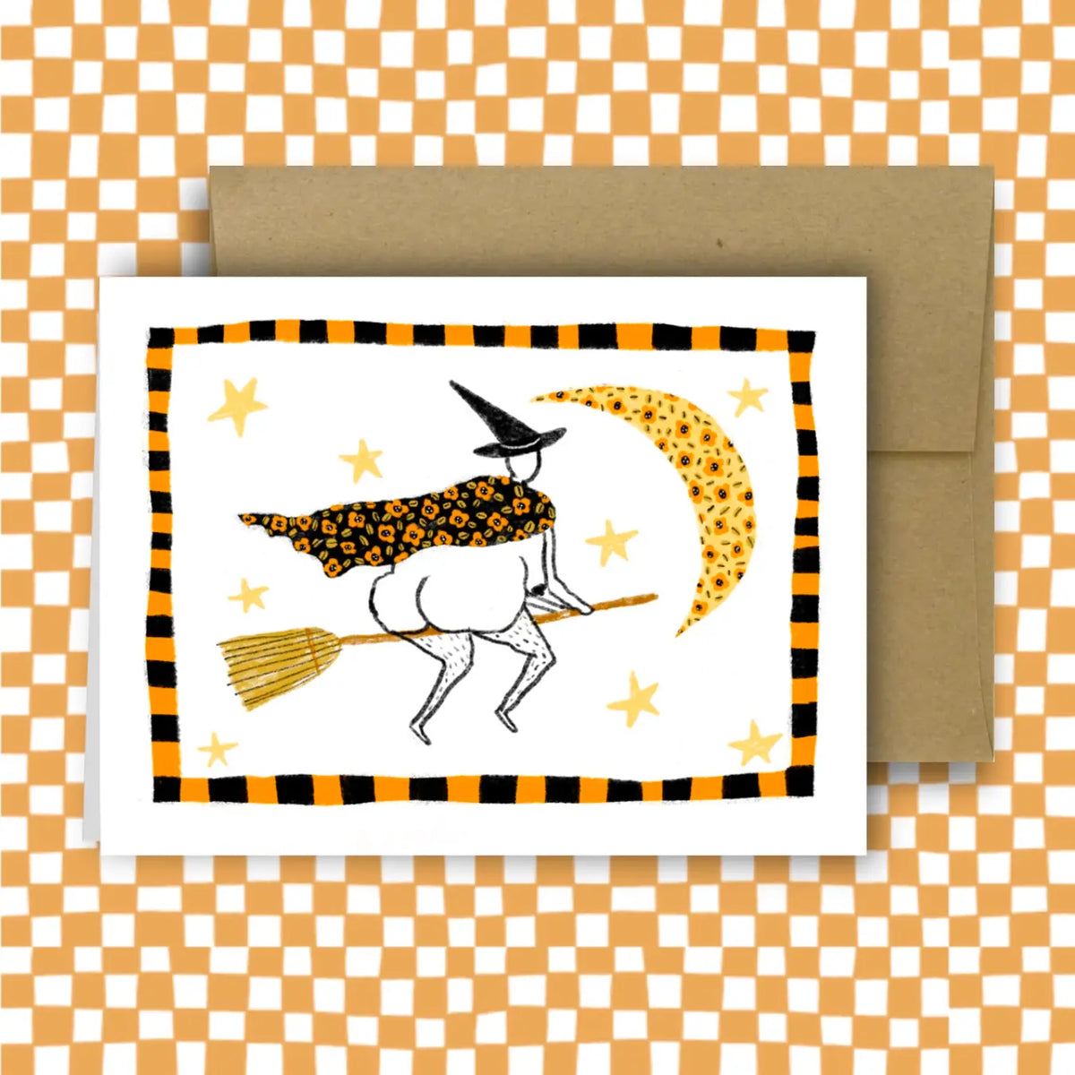 Halloween-themed card with a witch on a broomstick design on a checkered background.