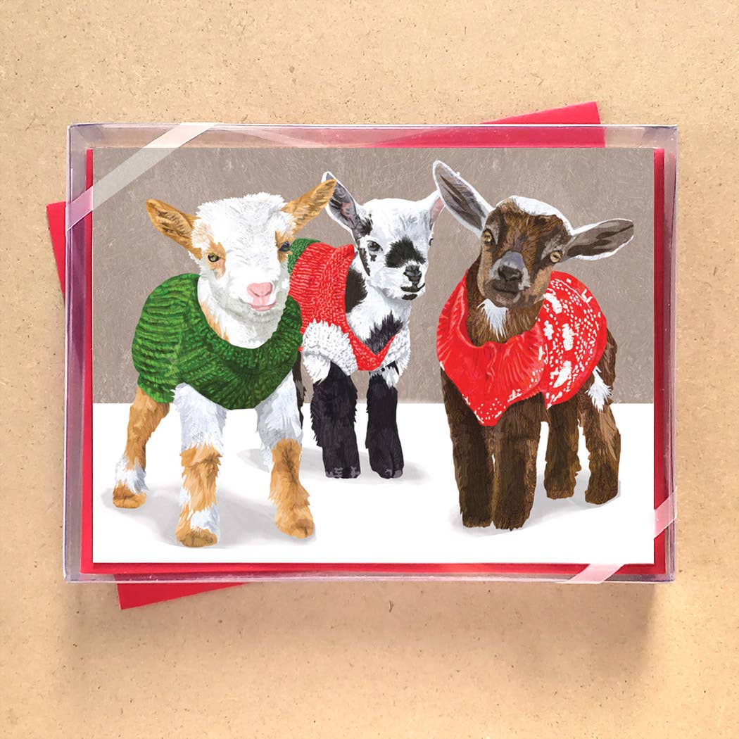 Box of Handillustrated Christmas Card featuring 3 baby goats in knitting christmas sweaters 