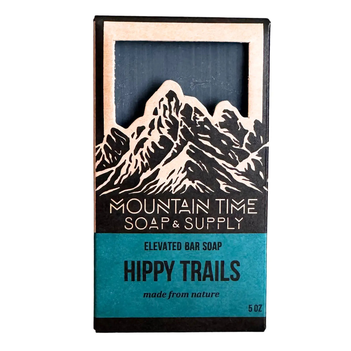 Bar of soap with 'Mountain Time Soap & Supply' branding and mountain design on packaging.