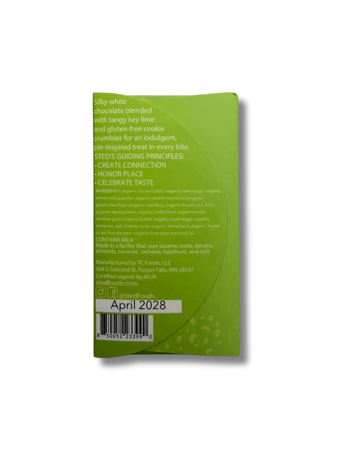 Green product packaging with text and a barcode on a white background