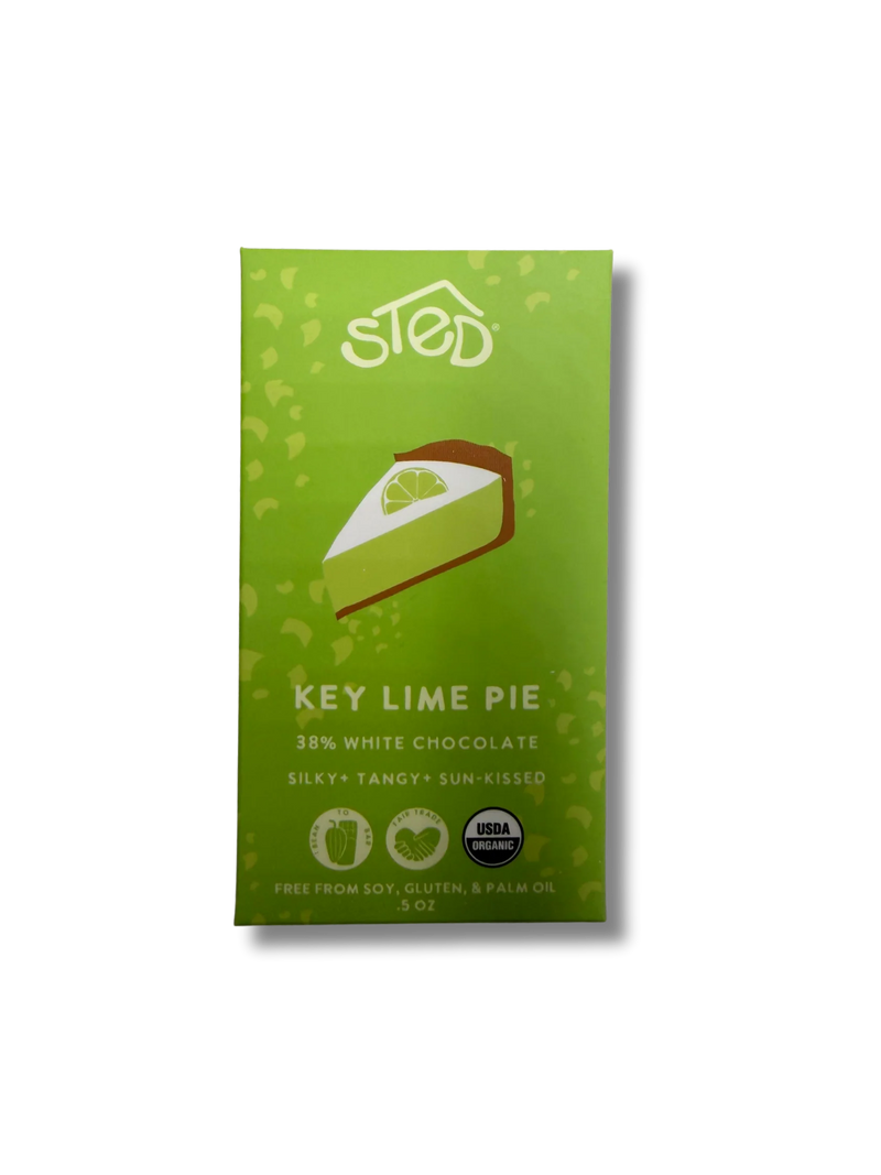 A green package of Sled Key Lime Pie chocolate, featuring a slice of lime pie illustration and text indicating 38% white chocolate.