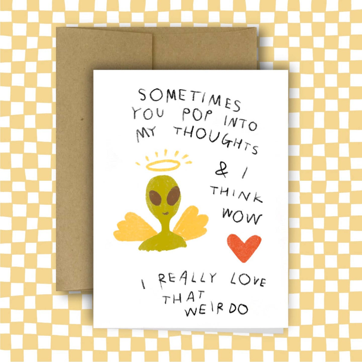 Card with alien illustration and text on a checkered background