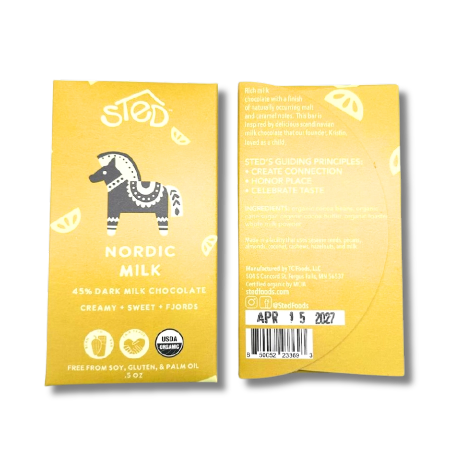Yellow packaging of Nordic Milk chocolate with a horse illustration on a white background