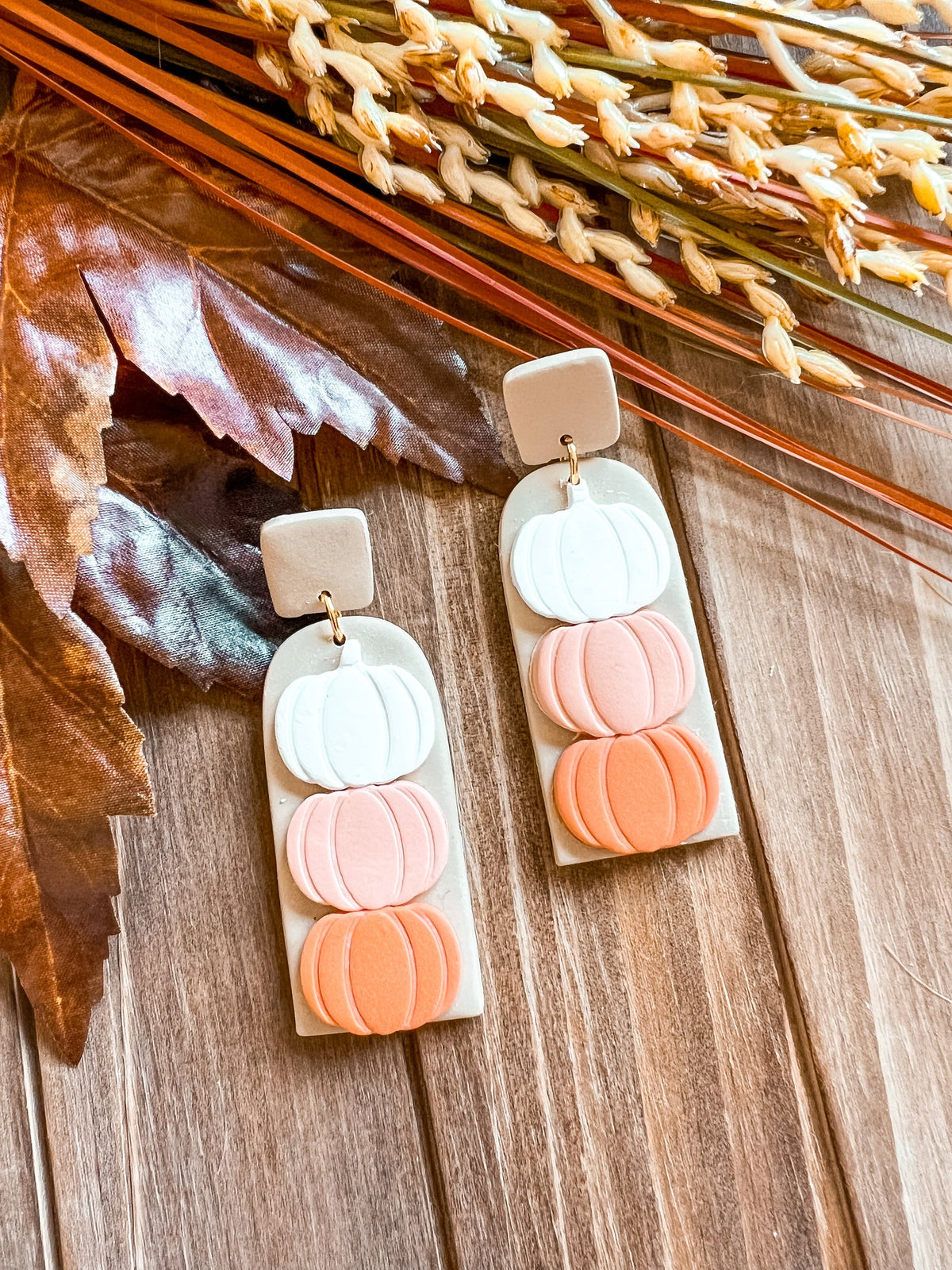 Polymer Clay Earrings with Three Pumpkins in an Ombre white, pale orange, and orange