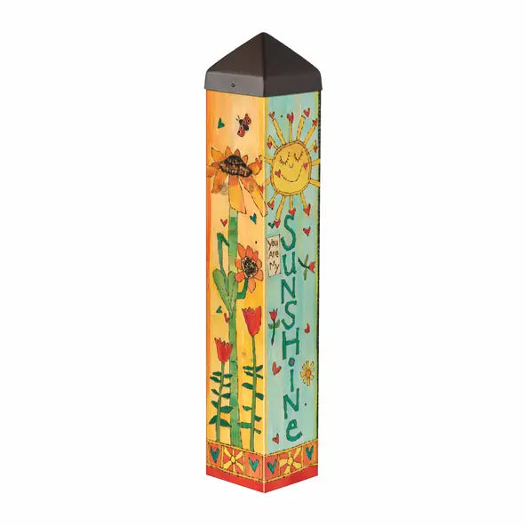Decorative garden stake with sunflower design and 'You are my sunshine' text on a white background