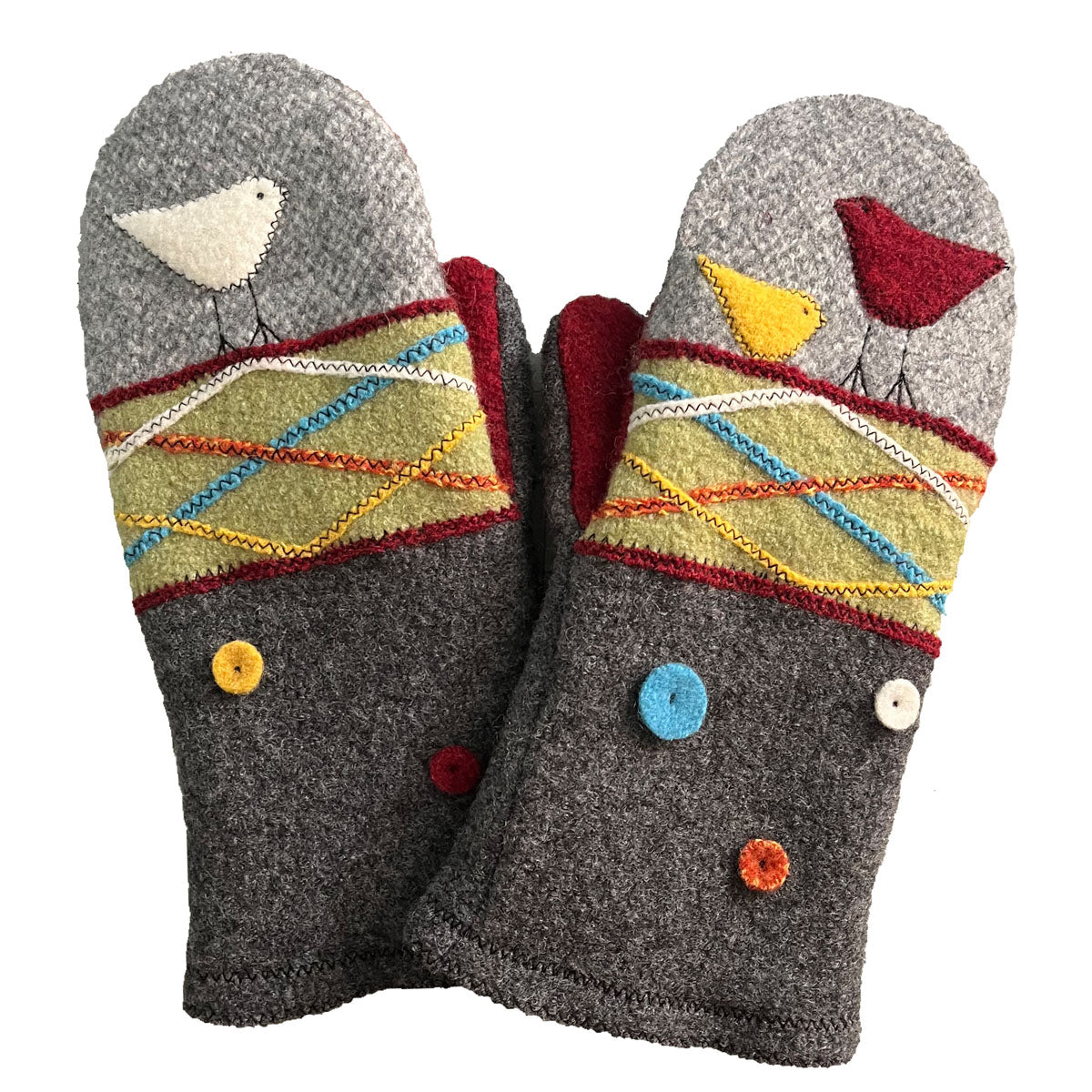 Pair of mittens with colorful patterns and bird designs on a white background