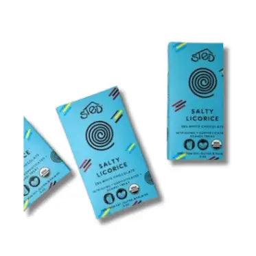Three packages of Salty Licorice on a white background
