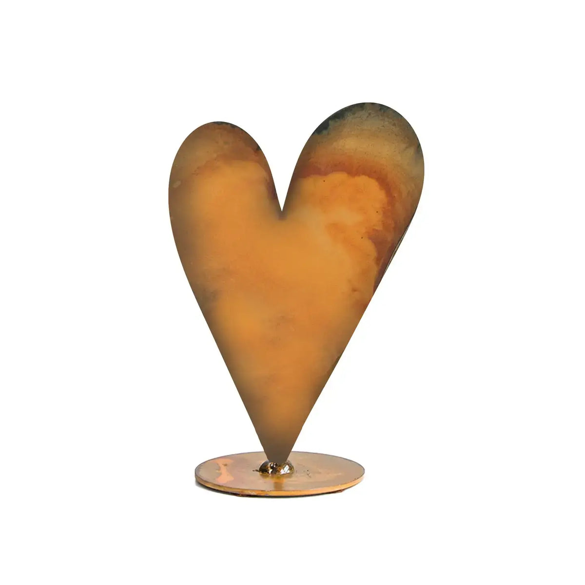 A sculptural heart-shaped metal sculpture with a warm orange-brown gradient finish and a polished copper-toned circular base, shown against a plain white background.