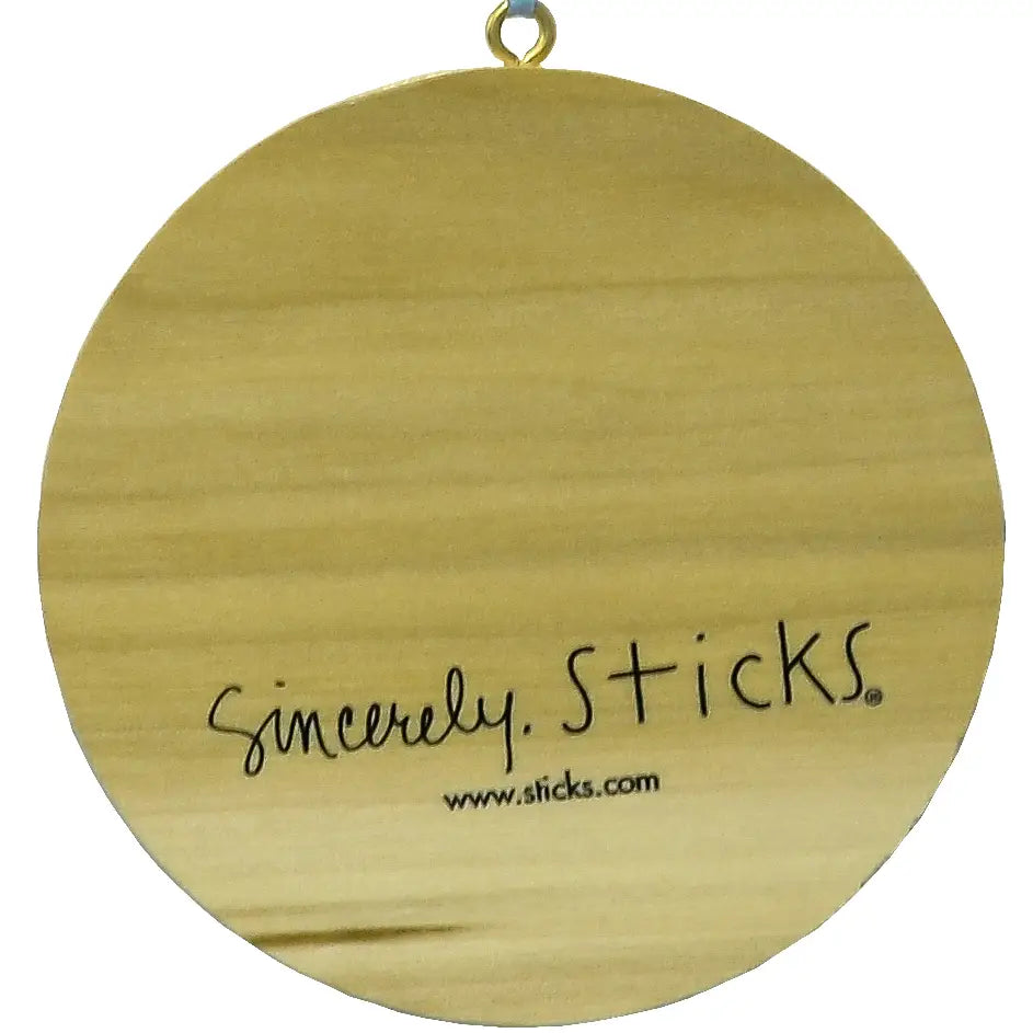 Round wooden sign with 'Sincerely, Sticks' text and website URL on a white background