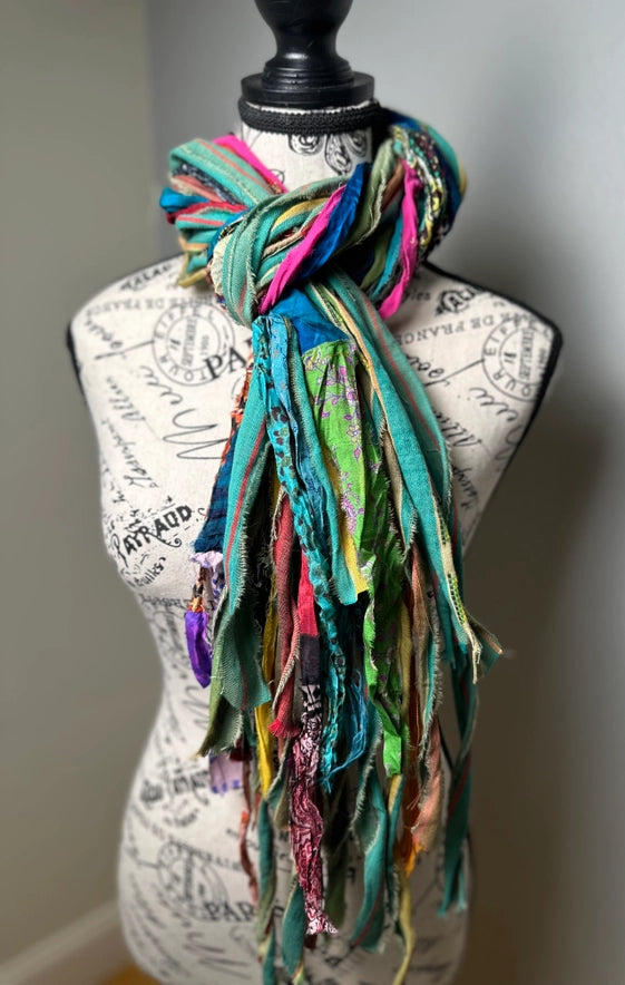 Colorful scarf on a mannequin with a vintage-style background