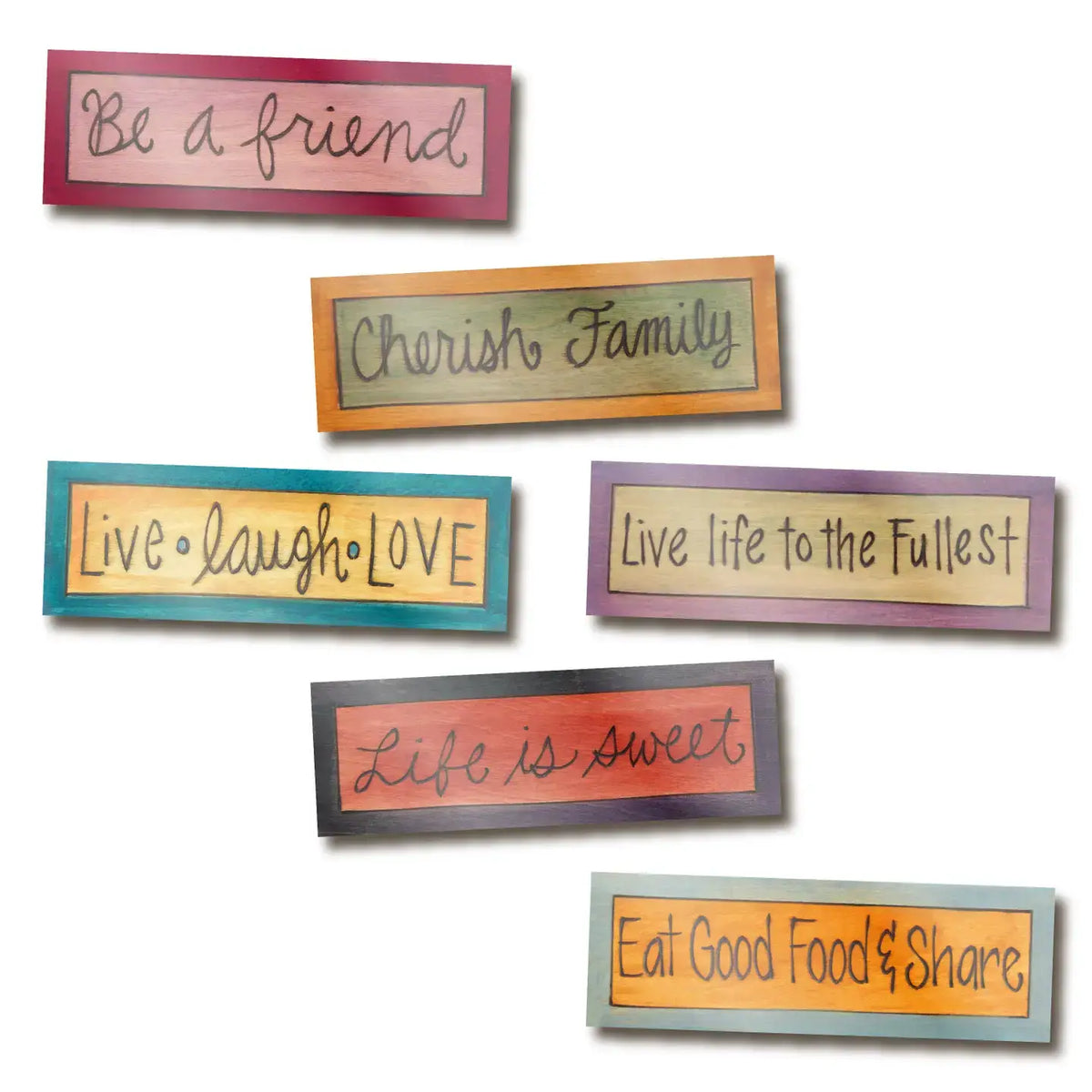 Set of colorful acrylic wooden looking magnets with motivational phrases on a white background