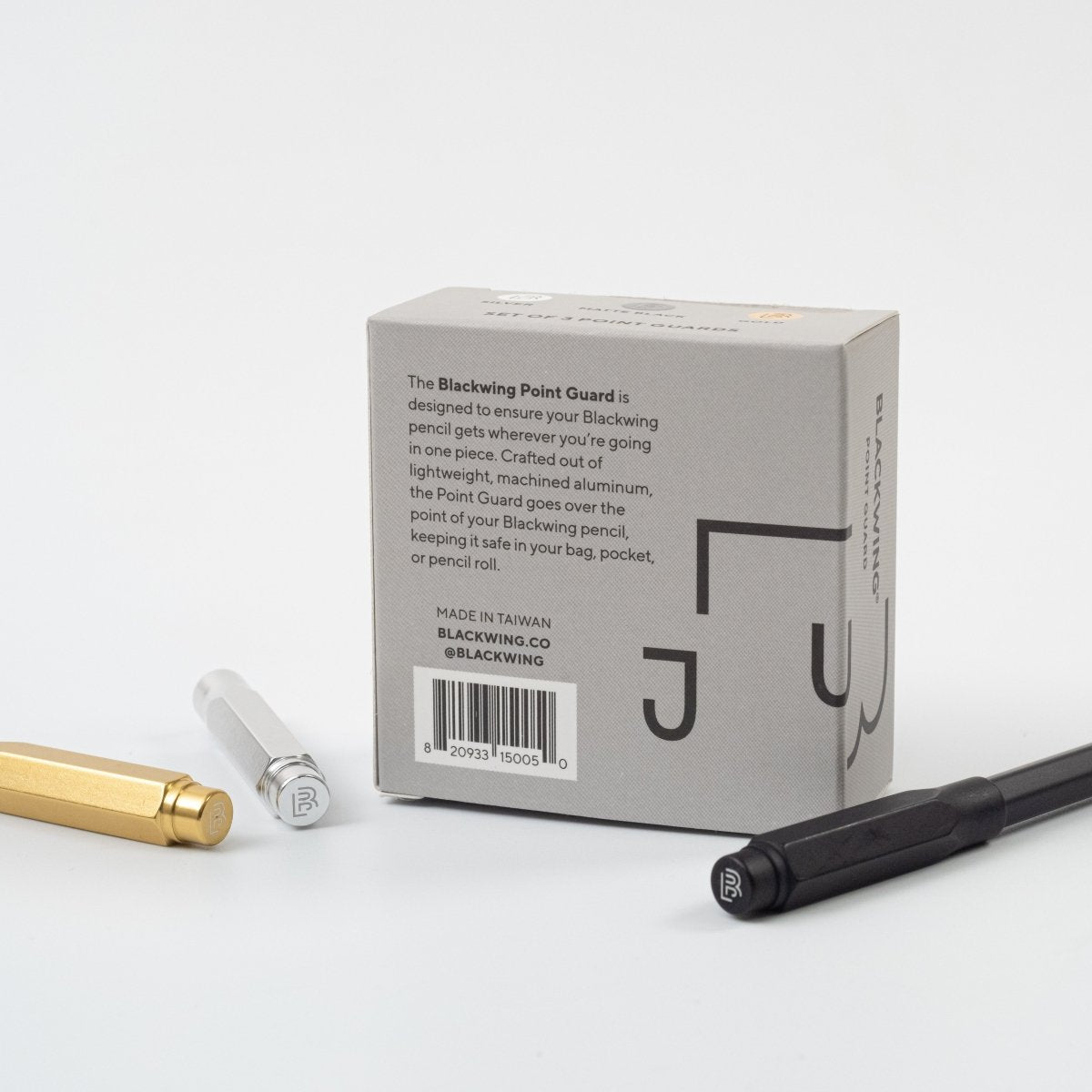 Blackwing pencil point guards and packaging on a white background