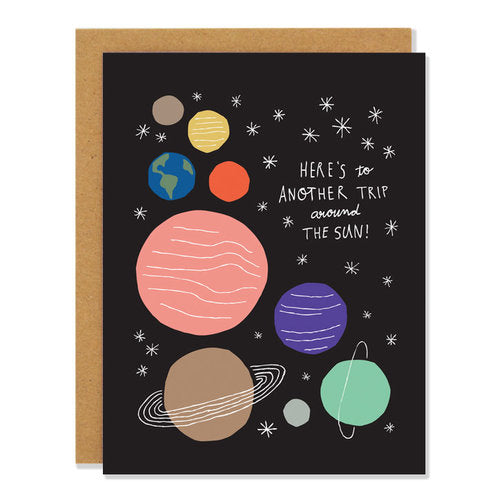 Birthday Card featuring Floating Planets and Congratulating the Reader on Another Trip Around the Sun. 