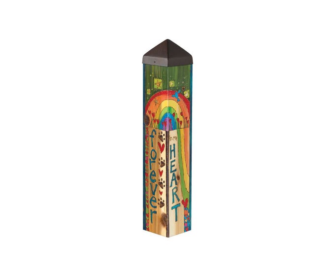A 20-inch tall art pole with a colorful base and a rainbow bridge design, featuring the artwork of Stephanie Burgess.