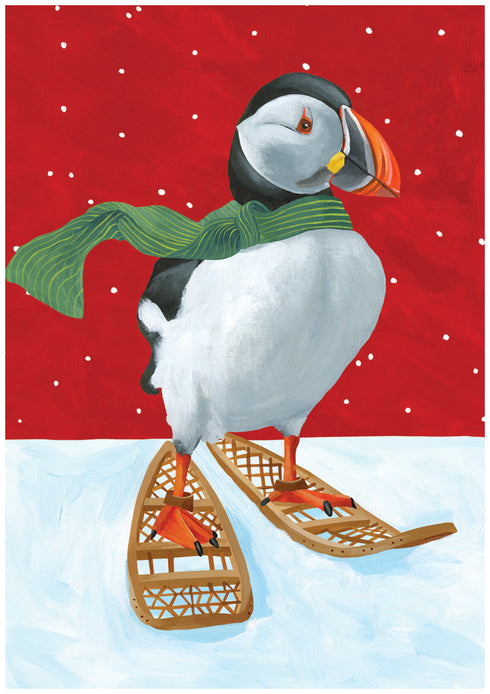 Illustration of Puffin wearing snowshoes is the cover of these holiday cards