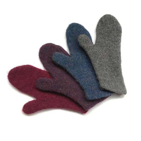 A display of the four colors available for the mittens, handmade by Julie Sinden Handmade.
