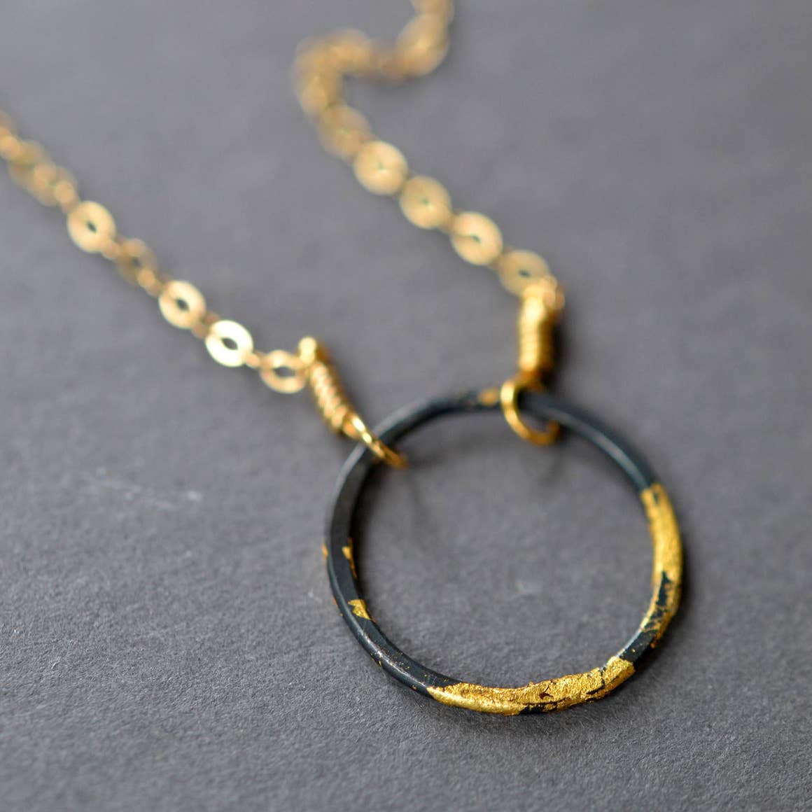 Steel and 23k gold circle necklace