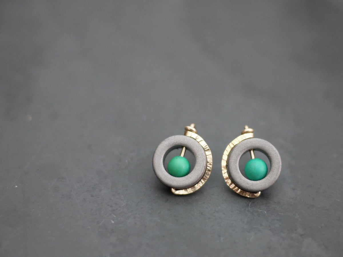 Post Earrings with a Yellow Gold Encircling a Hematite Donut with a Turquoise Center Bead