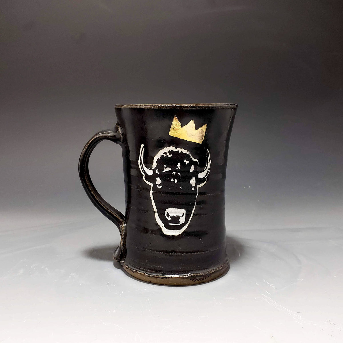 Black Ceramic Mug with a bison head wearing a gold lustre crown