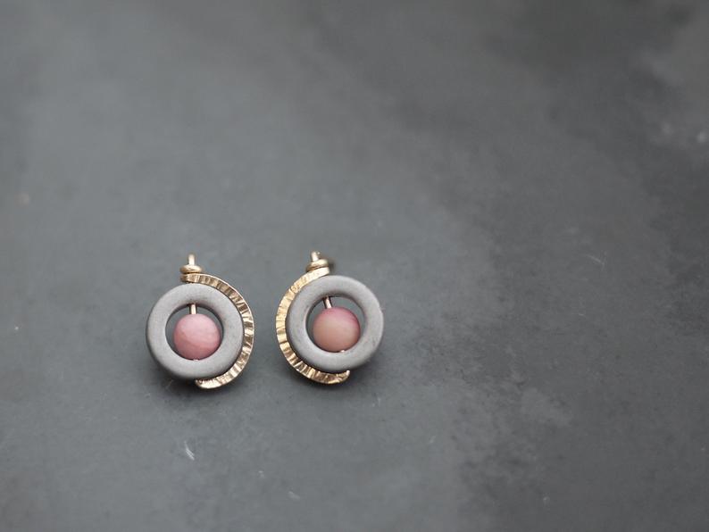 Post Earrings with a Yellow Gold Encircling a Hematite Donut with a Rhodonite Center Bead